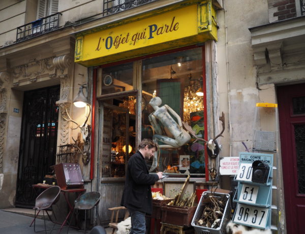 Exterior of small antiques and oddities shop in Montmartre Paris named L'objet qui Parle