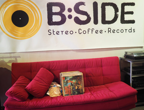 The red couch at B Side Stereo in Tel Aviv is a spot to find friends and the local street cat who likes to beg for pets